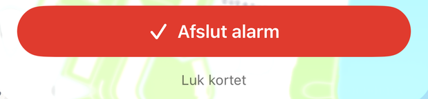 Kortet på din egen alarm: den røde knap "Afslut alarm" og linket "Luk kortet" under.
